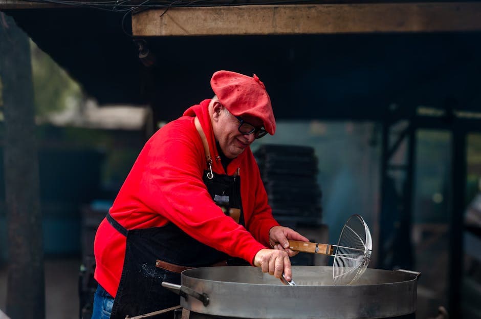 Street vendor cooking local cuisine in Buenos Aires, highlighting vibrant culture and culinary tradition.