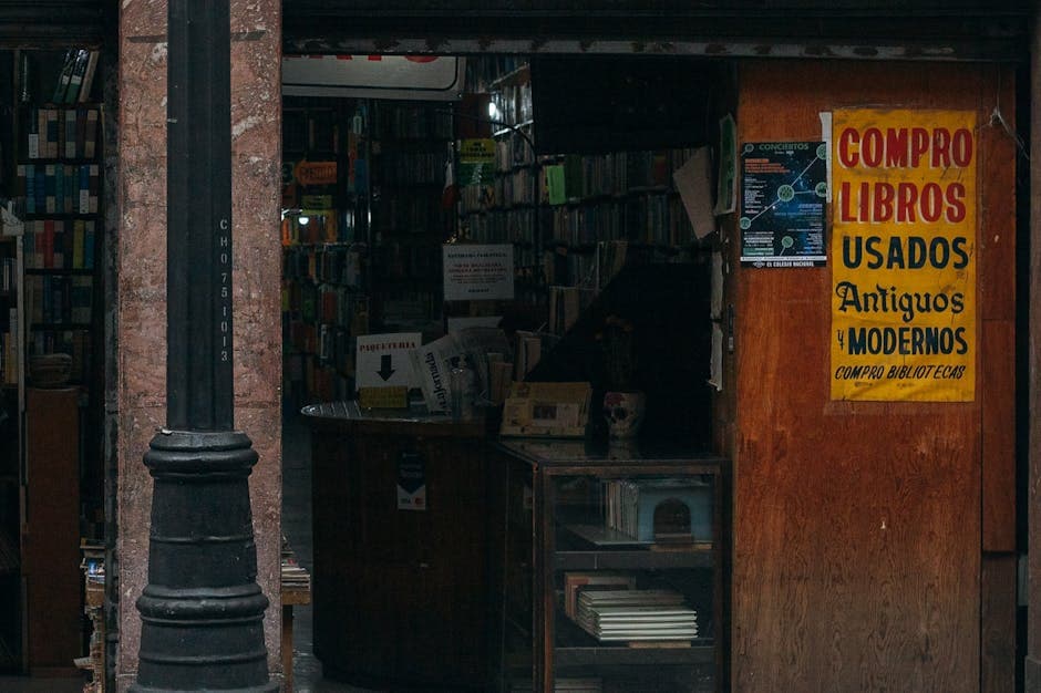 An inviting bookstore entrance displaying a vibrant sign in Mexico City, CDMX, Mexico.