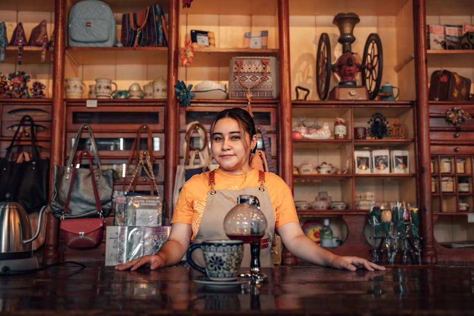 Portrait of a young woman standing behind a counter in a traditional Mexican store in Lerma de Villada.