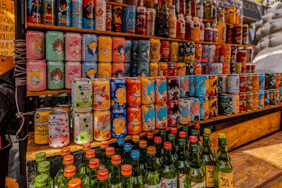 Vibrant display of Korean drinks and sodas at a bustling market in Mexico City.