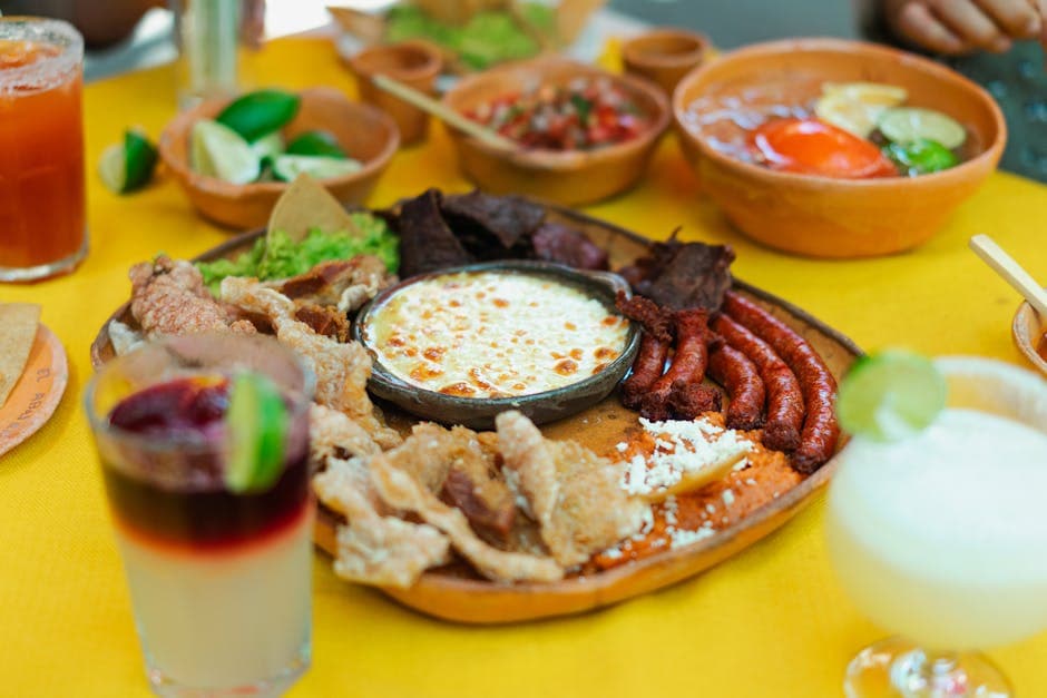 A vibrant spread of traditional Mexican food on a colorful table, perfect for a festive meal.