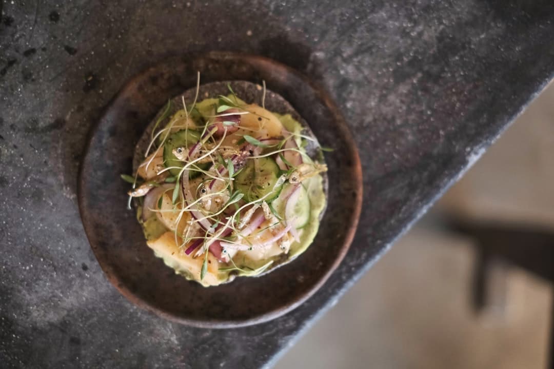 a small bowl of food on a table