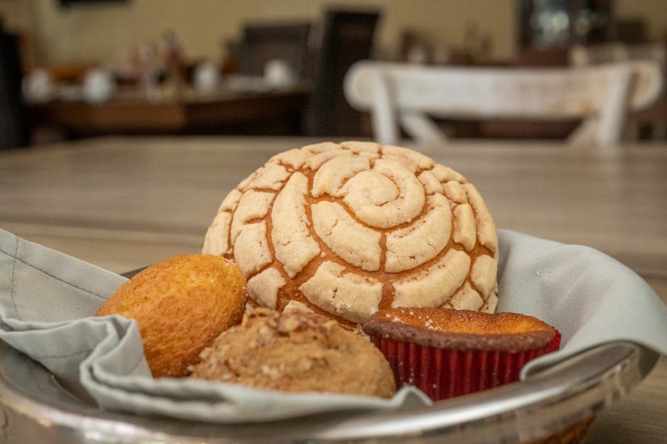 A variety of traditional Mexican pastries served in a café in Guanajuato, México, showcasing delicious textures.