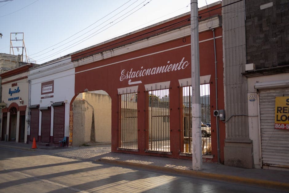 View of a traditional street scene in Heroica Matamoros, showcasing vintage architecture and cultural charm.