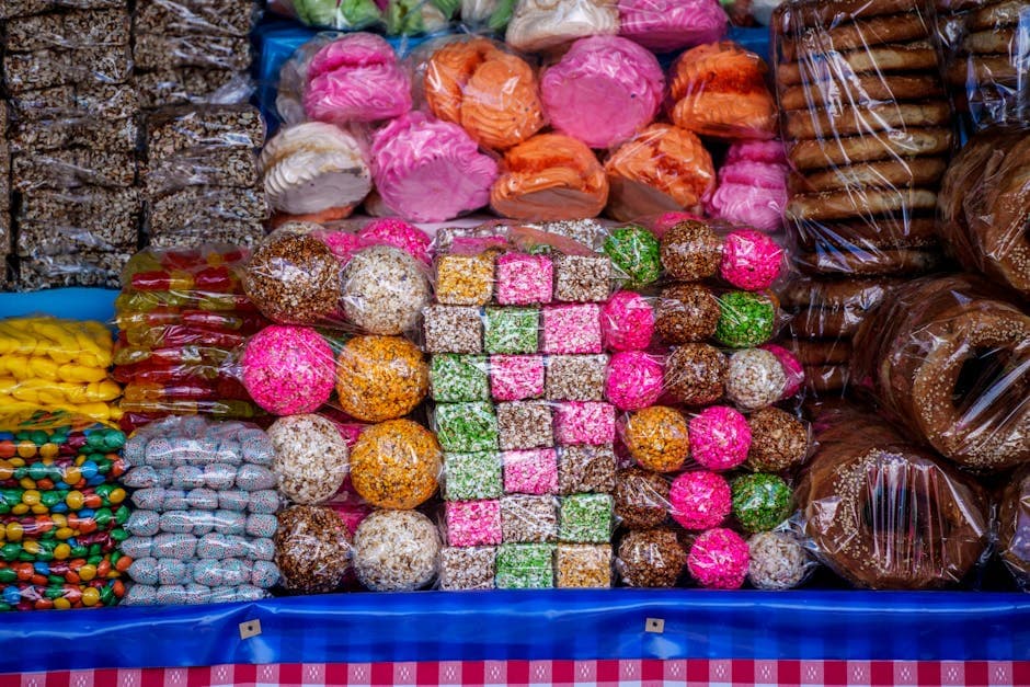 Vibrant display of traditional Guatemalan sweets at a market stall. Perfect for celebrating local culture.