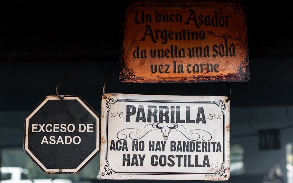 Vintage signs at an Argentinian grill highlighting asado culture in Uribelarrea.