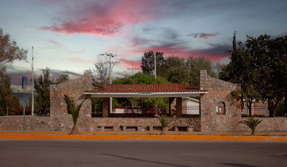 Scenic view of a stone pavilion in Bocas, S.L.P., México with a vibrant sunset sky.