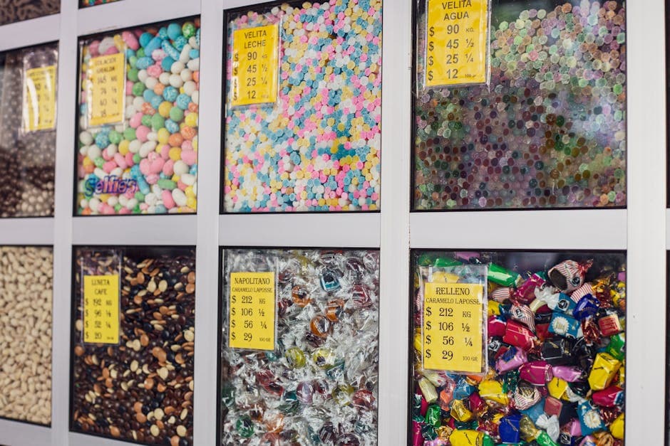 Vibrant candy display behind glass in a Ciudad de México shop. Perfect for confectionery lovers.