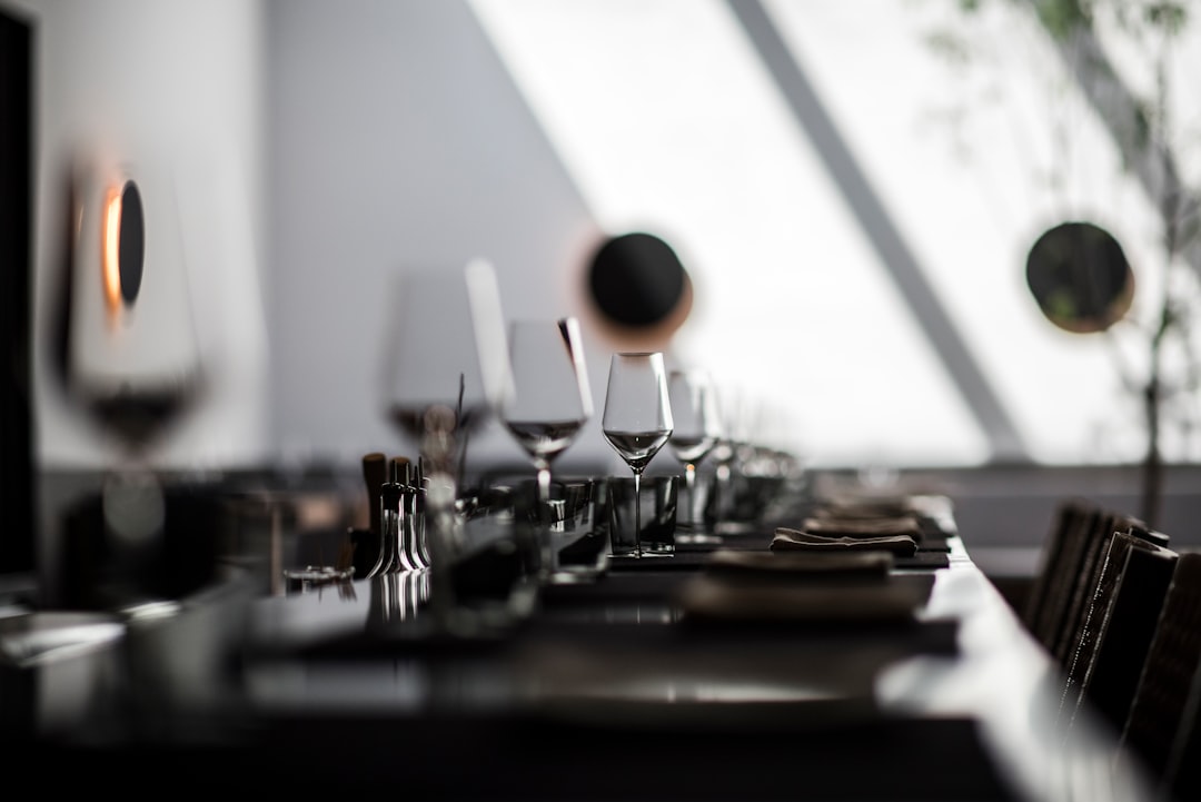 black and white ceramic mugs on table