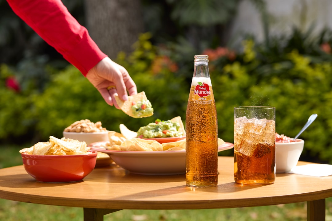 Someone is enjoying food and drink outdoors.