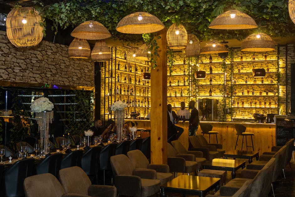 Beautiful bar interior with warm lighting and wooden accents, creating an inviting atmosphere.