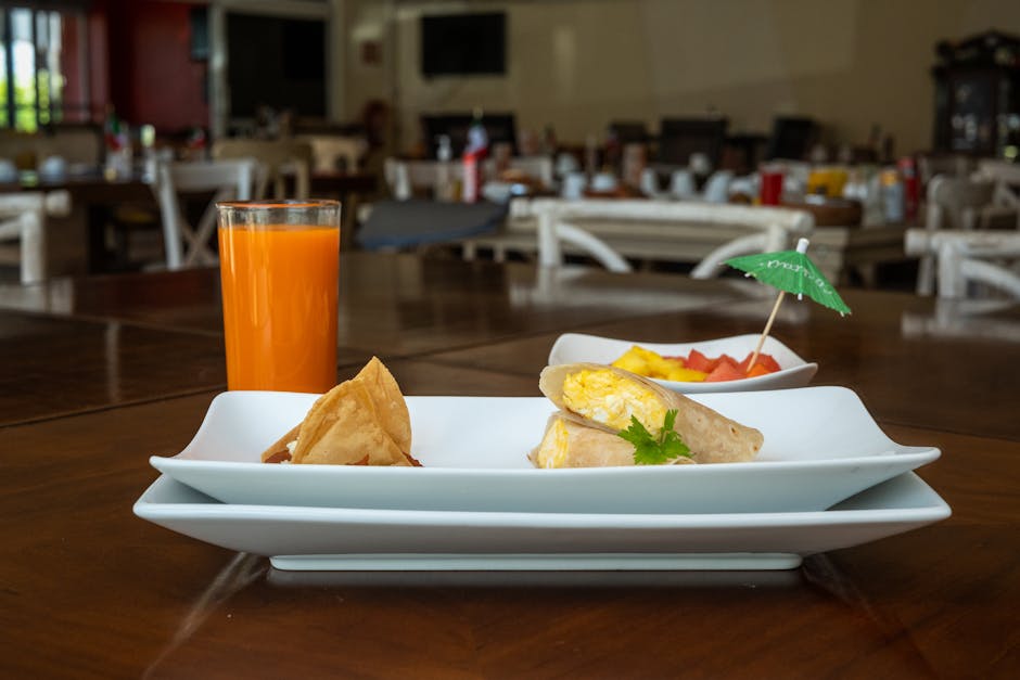 A delicious Mexican breakfast with fresh juice and fruit served in Salamanca, Mexico.