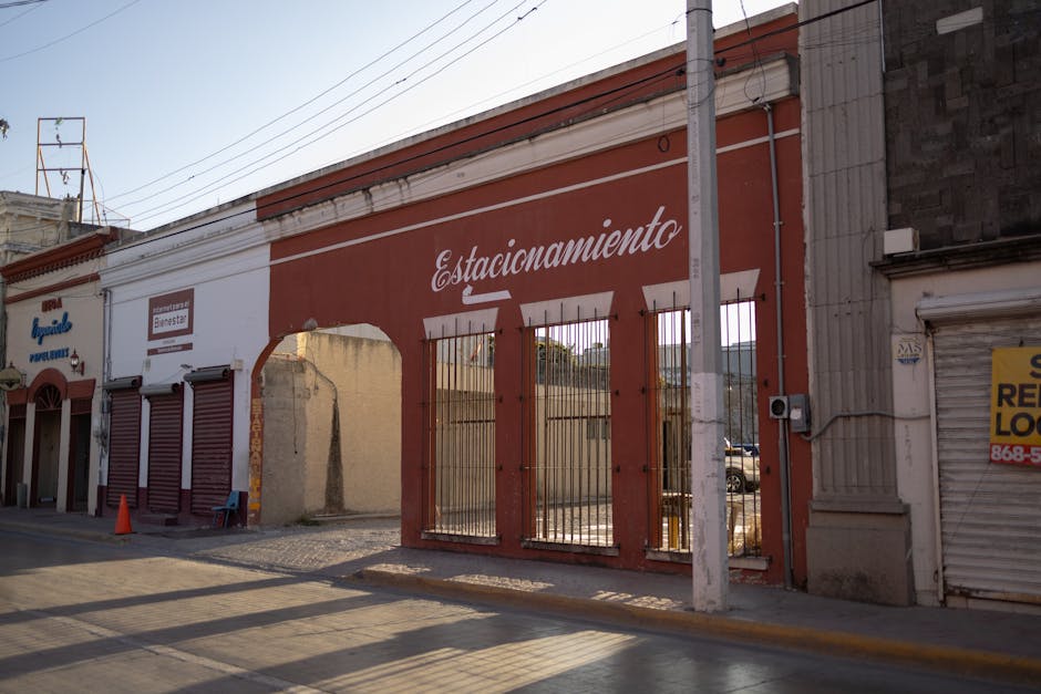 View of a traditional street scene in Heroica Matamoros, showcasing vintage architecture and cultural charm.