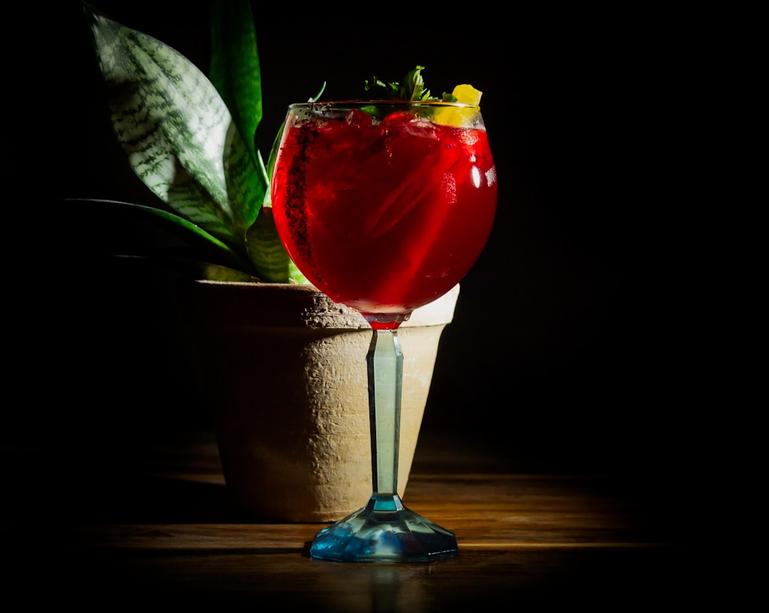 a red rose in a glass vase