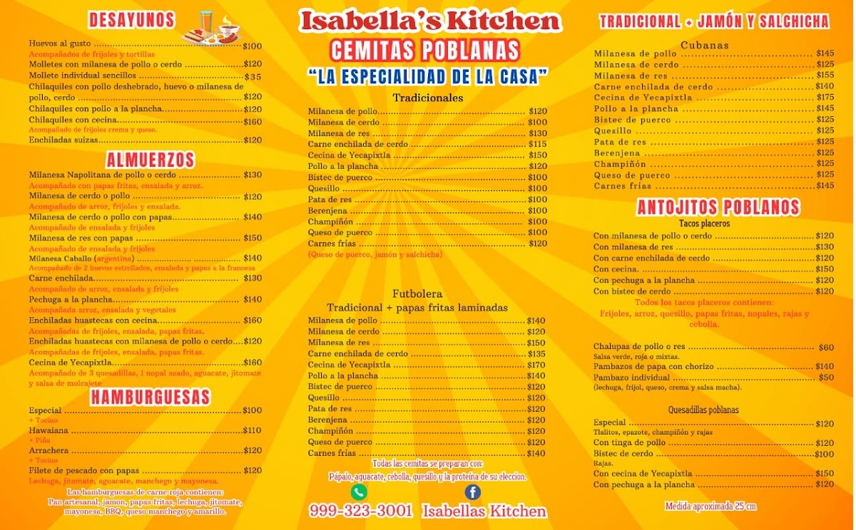 Interior de Isabellas Kitchen: barra de servicio, plancha de hierro y mesas de metal con manteles coloridos