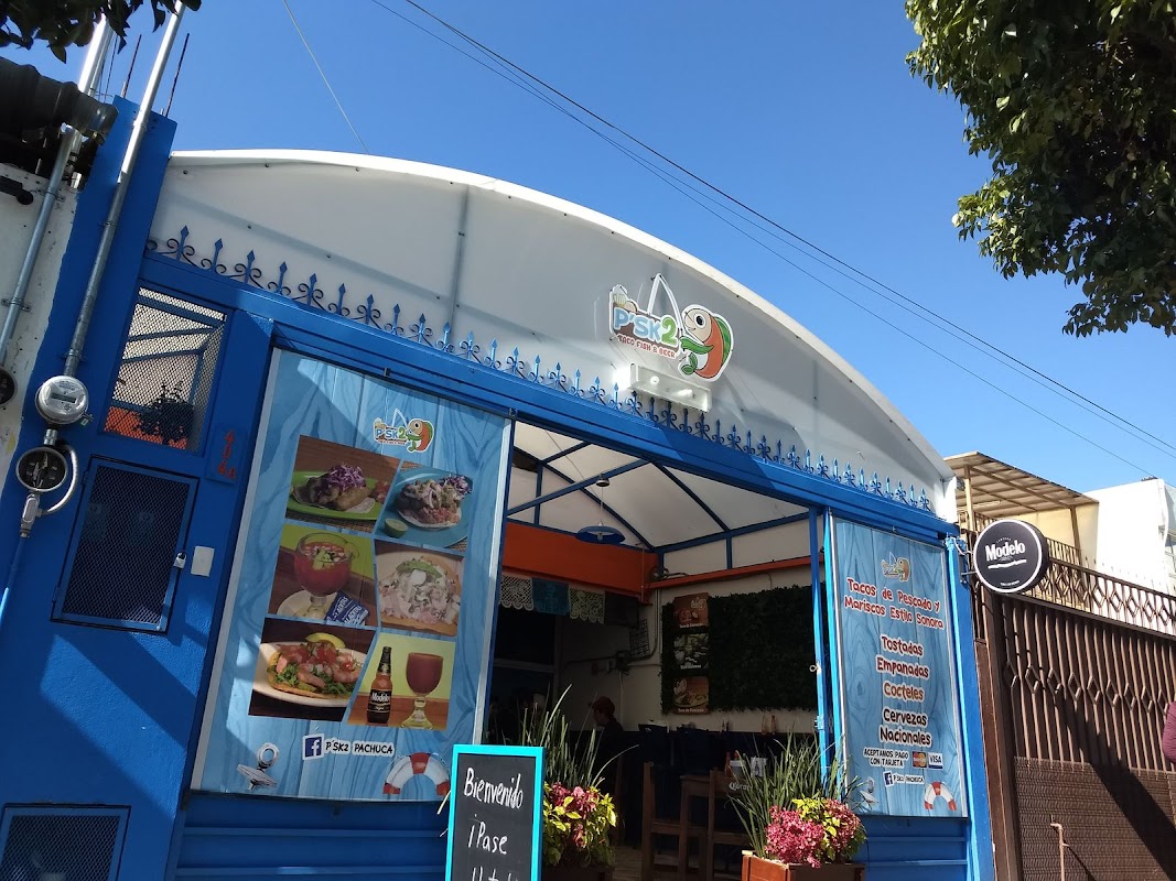 P'SK2 Taco Fish & Beer — barra con cerveza artesanal y tacos de pescado al pastor, enfoque en el taco de marlin al pastor con salsa jamaicana