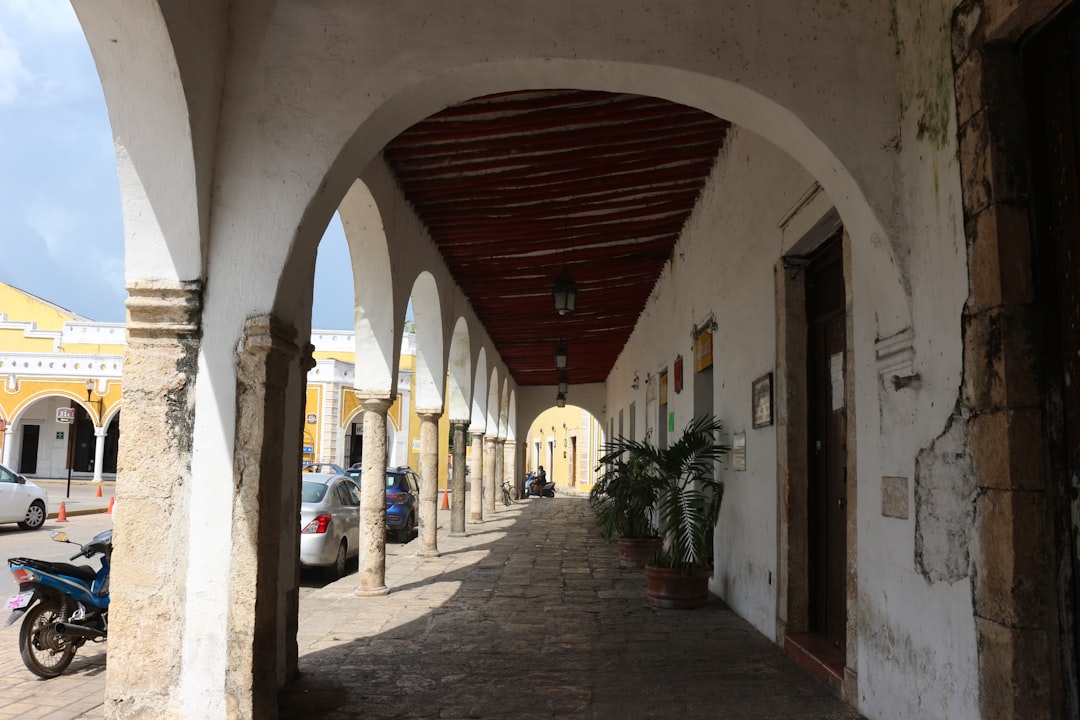 a street with cars and buildings