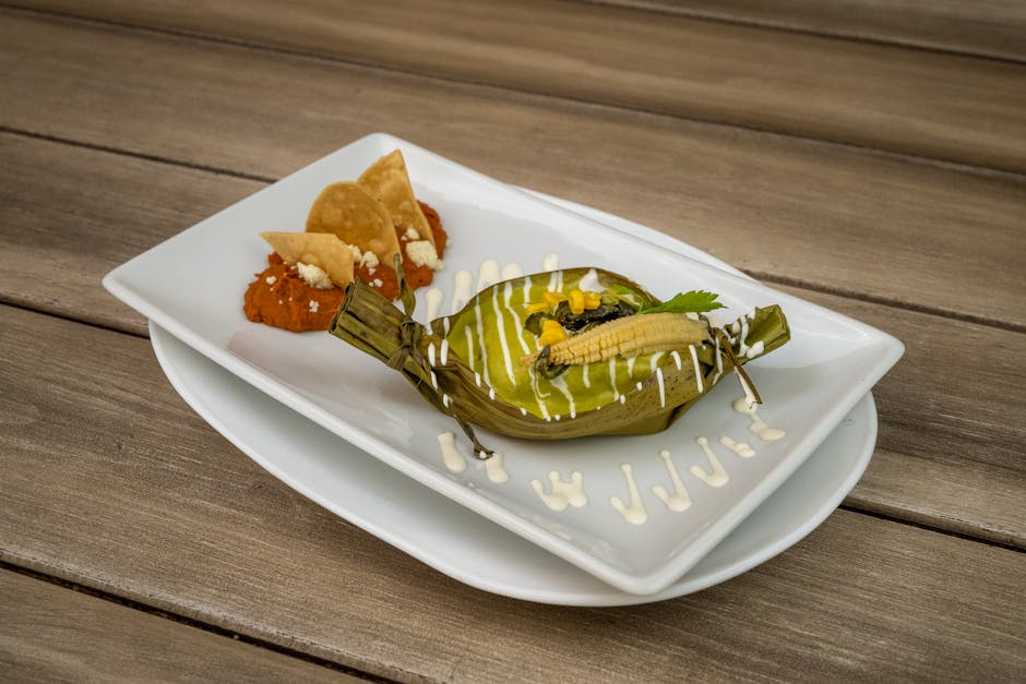 Delicious plated Mexican tamale served in a Guanajuato restaurant, capturing local flavors.