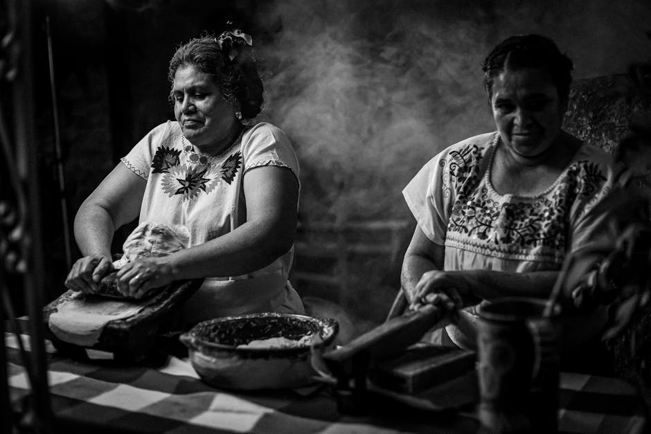 Women in Jalisco making tamales in a traditional indoor setting.