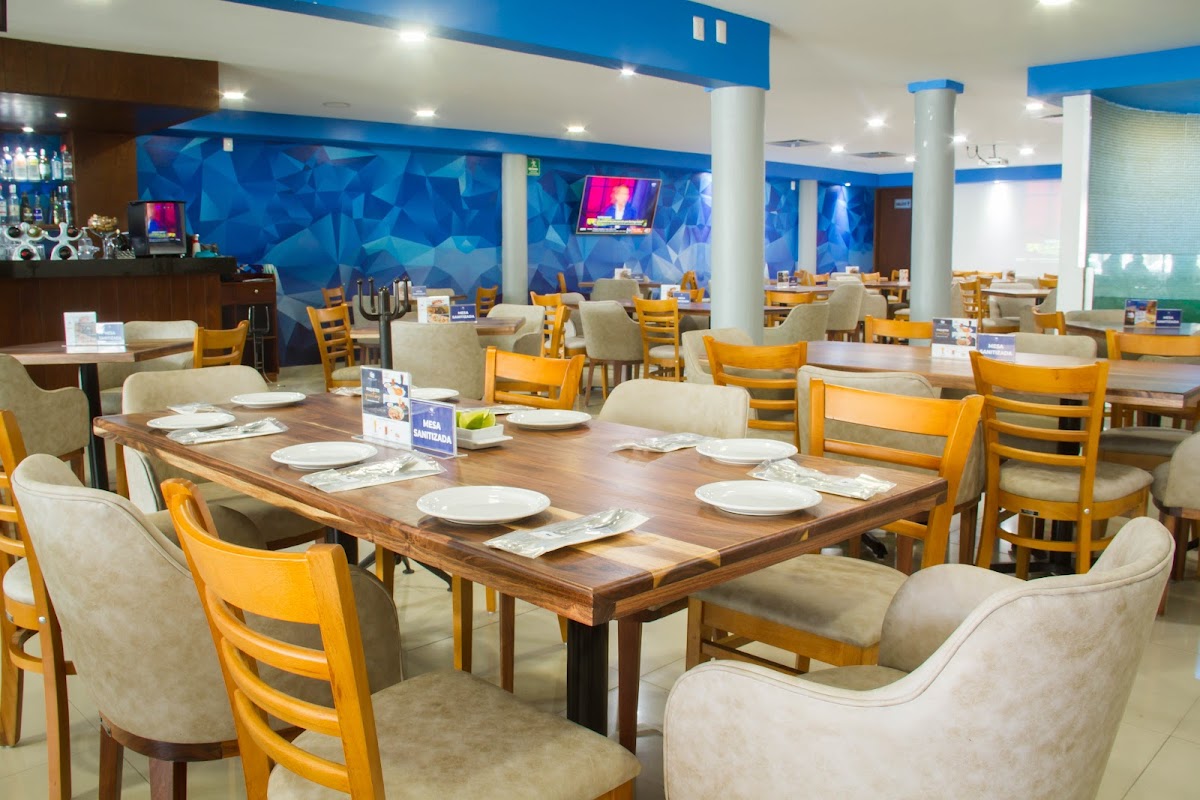 Restaurante Rio De La Plata — buffet spread featuring albacore slices and mojo sauce